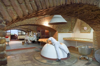 Georgia, Tbilisi, Old City, traditional bakery with a floor oven