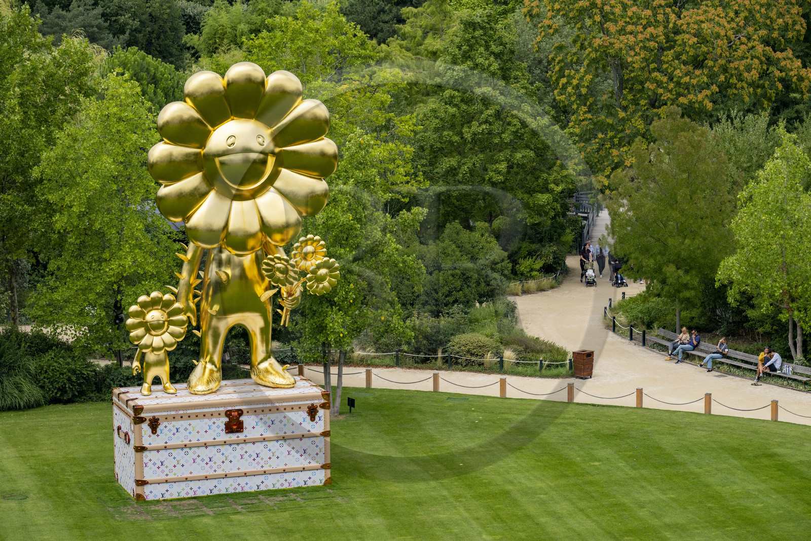 France, Paris, Bois de Boulogne, a sculpture The Flower parent and the child by the artist Takashi Murakami in collaboration with Louis Vuitton at the Jardin d’acclimatation