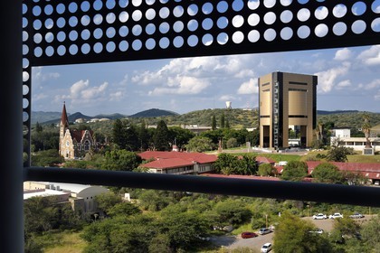 Namibia, Khomas region, Windhoek, Christ Church (or Christuskirche), Lutheran church designed by architect Gottlieb Redecker and the Independence Memorial Museum built by North Korea