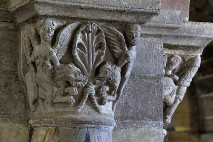 France, Haute Loire, Brioude, the Basilica of Saint-Julien de Brioude in Auvergne Romanesque style, carved capitals decorated with patterns, winged geniuses