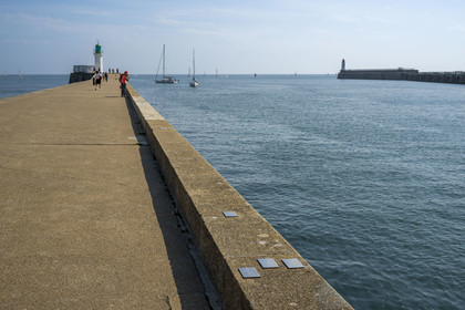 France, Vendee, Les Sables d'Olonne, the Jetty of the classified skippers of the Vendée Globe race, 113 plaques are arranged on the wall of the Petite Jetée and constitute a time line of 178 meters where 2 meters represents 1 day