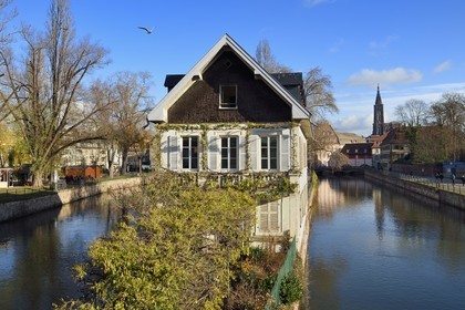 France, Bas Rhin, Strasbourg, old town listed as World Heritage by UNESCO, la Petite France District, corner Ponts Couverts and quai du Woerthel along one of the branches of the Ill river and the Cathedral in the background