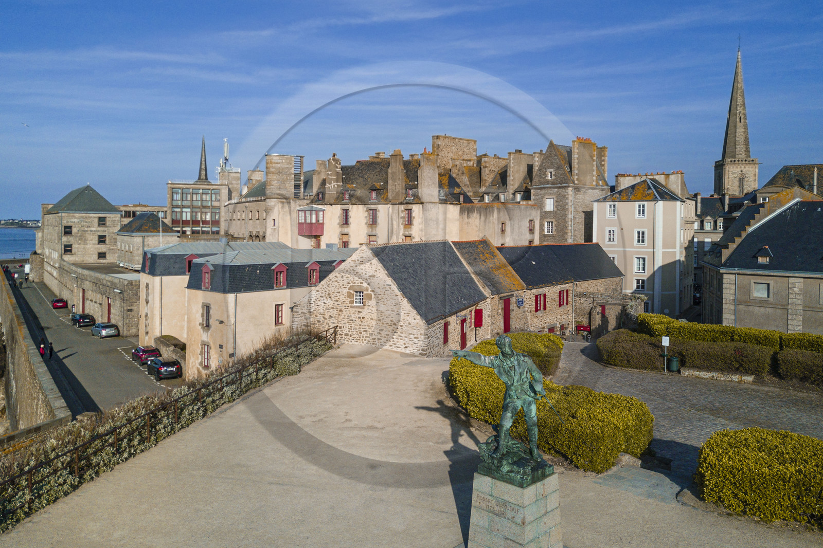 France, Ille et Vilaine, Cote d'Emeraude (Emerald Coast), Saint Malo, the walled city, statue of the privateer Robert Surcouf made by the sculptor Alfred Caravaniez at the end of the XIXth century on the ramparts of the garden of the place du Québec (aerial view)