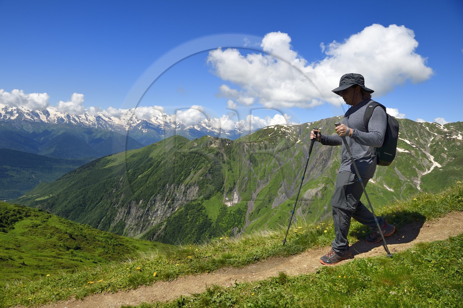 Georgia, Upper Svaneti (Zemo Svaneti), Mestia, hiker on the foothills of Mount Ushba coming from Guli pass
